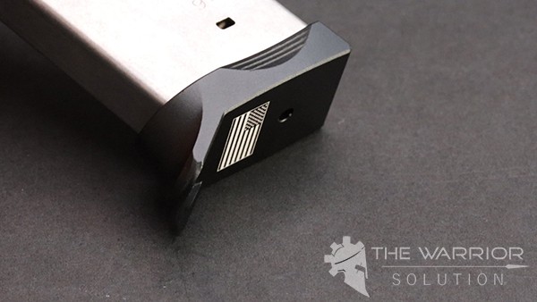 Bastion Gear magazine baseplate installed on smith and wesson magazine laser etched with american flag